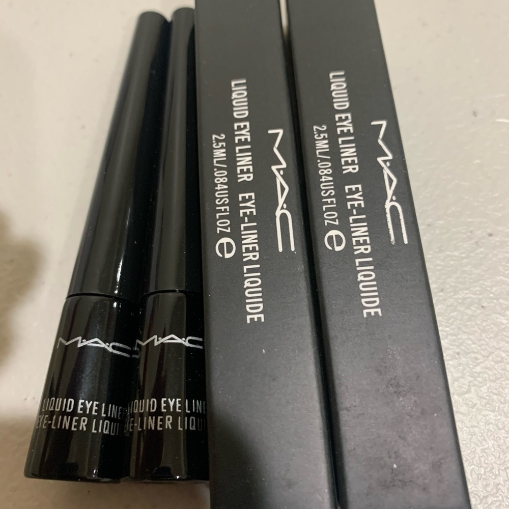 - 2 new Mac liquid black eyeliner